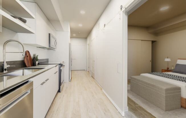 a bedroom with a bed and a sink in a room at Marina Square, Bremerton, WA, 98337