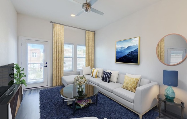 a living room with a white couch and a coffee table