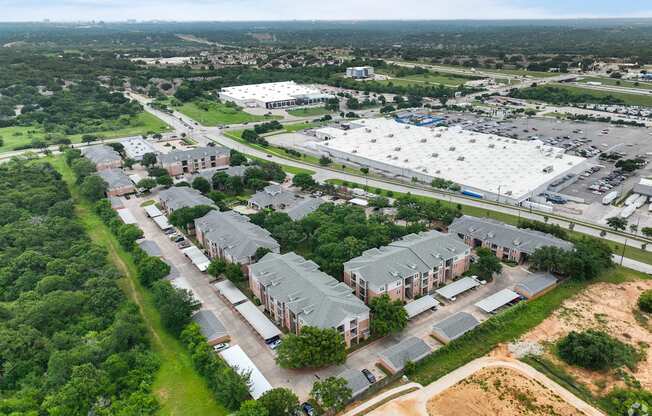 an aerial view of a neighborhood of houses in a city