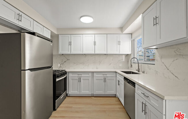 7825 W MANCHESTER AVE