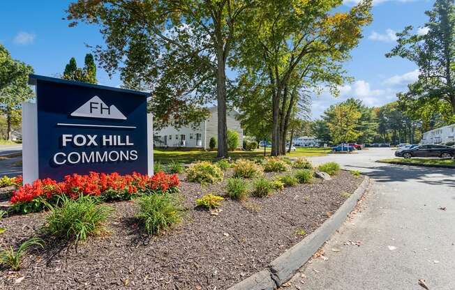 a sign of Fox Hill Commons at the entrance of the apartment complex at Fox Hill Commons, Connecticut