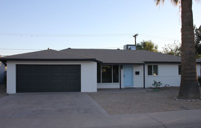 Beautiful 4 bedroom near Old Town Scottsdale with 2 car garage & Rent reduced! Under Market rate!