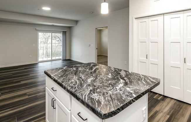 New building with white and dark color schemes with one, two and three bedroom apartment homes at CopperCreek Apartments in Council Bluffs, IA