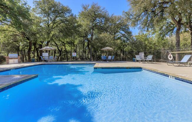 a pool next to a body of water