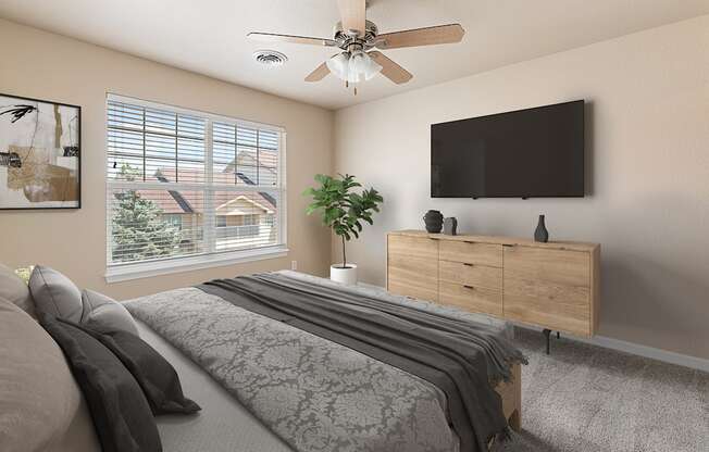 a bedroom with a bed and a ceiling fan