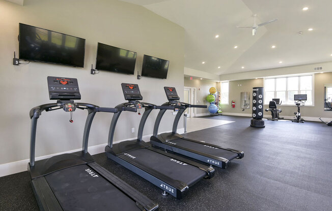 Variety of Fitness Equipment at Dodson Pointe Apartment Homes in Rogers, AR