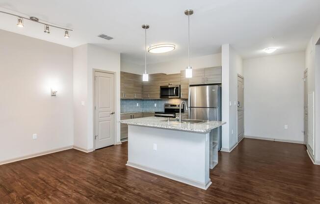 a kitchen with a tile floor