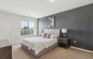 Cozy bedroom with ensuite bathroom at The Lofts at Middlesex