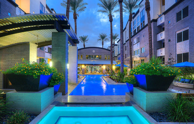 resort-style pool at night