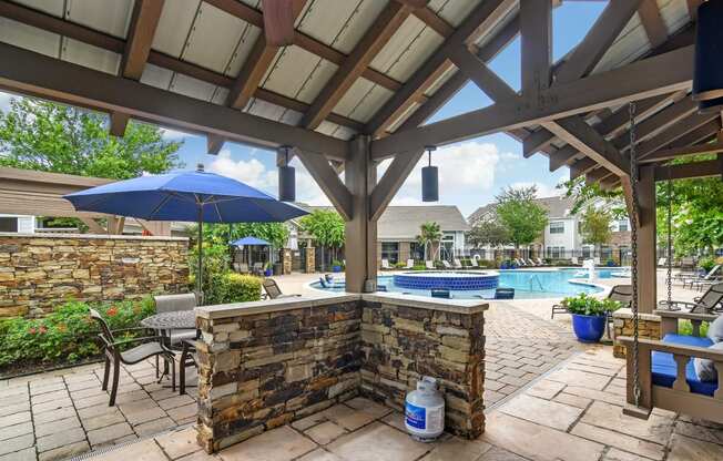 the preserve at ballantyne commons pool party area with umbrellas and tables