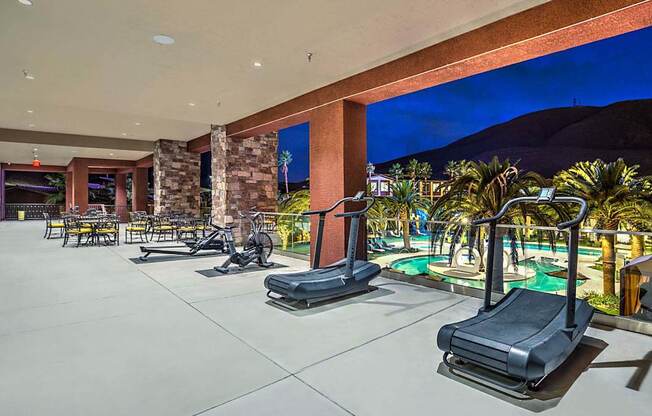 A gym with treadmills and exercise equipment.