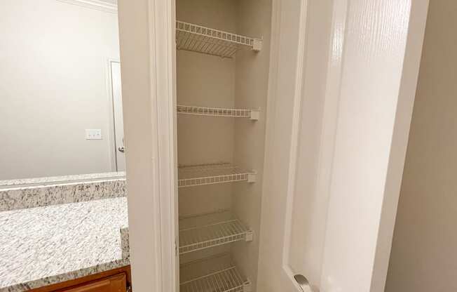 Bathroom Linen Closet with Shelving located in Lawrenceville, GA
