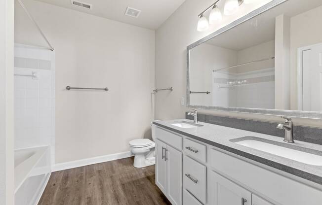 Master Bathroom with Double Sinks and Large Mirror