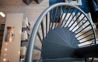 Interior spiral staircases in penthouse homes