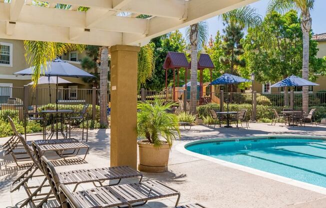 Swimming Pool With Lounge Chairs at The Landing, California, 92154