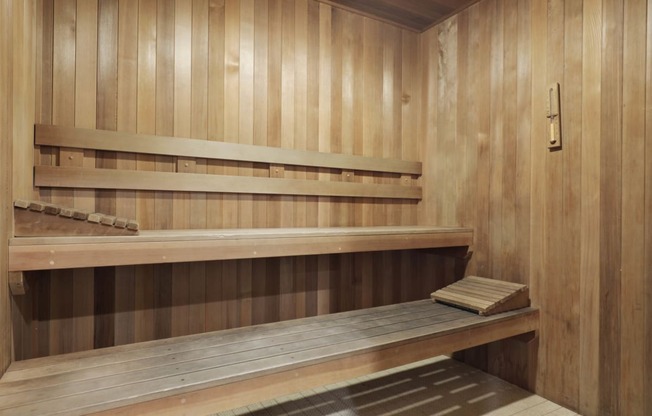 a sauna with wooden benches and wooden walls at Willow Tree Apartments, California, 90505