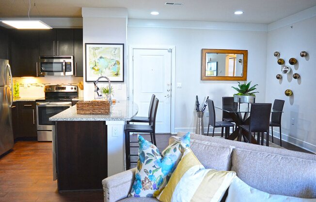 Dining Area With Kitchen View at Vanguard Crossing, St. Louis, MO, 63124