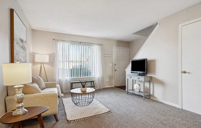 a living room with a couch and a television