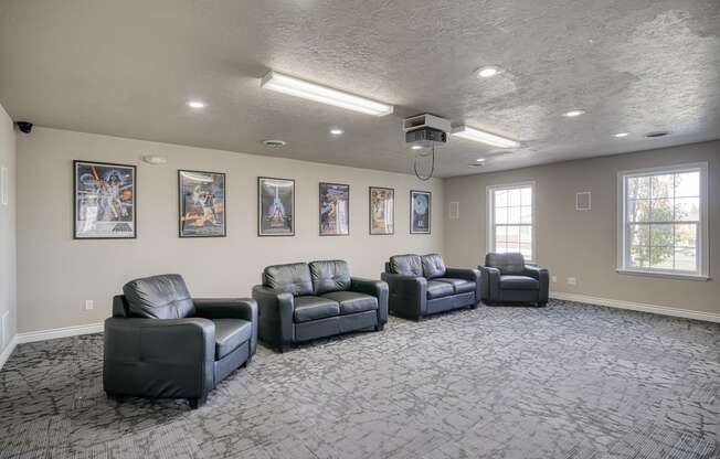 a large room with couches and chairs