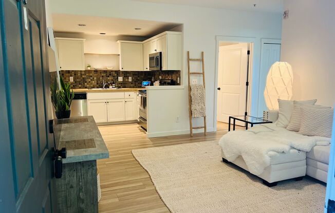 Beautifully Updated Lower Level 2 Bedroom Unit with Clubhouse, Pool, and Exercise Room