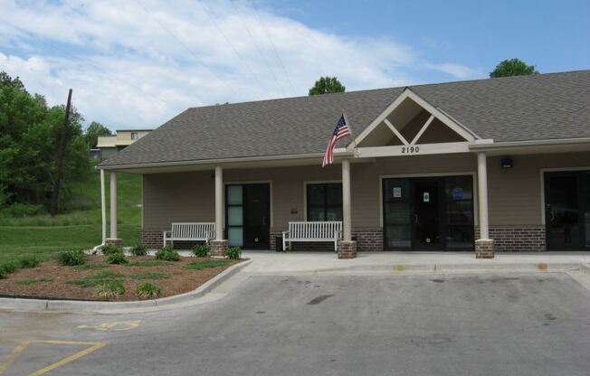 exterior of clubhouse with American flag flying