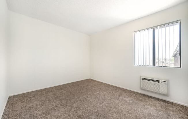 Bedroom with Large Windows at The Sands