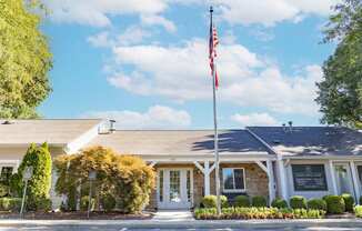 Clubhouse Exterior at Woodbridge of Bloomington Apartments