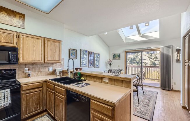 Evolve Real Estate: Gorgeous 4 Beds/4 Bath Residence with Magnificent Views in Genesee!