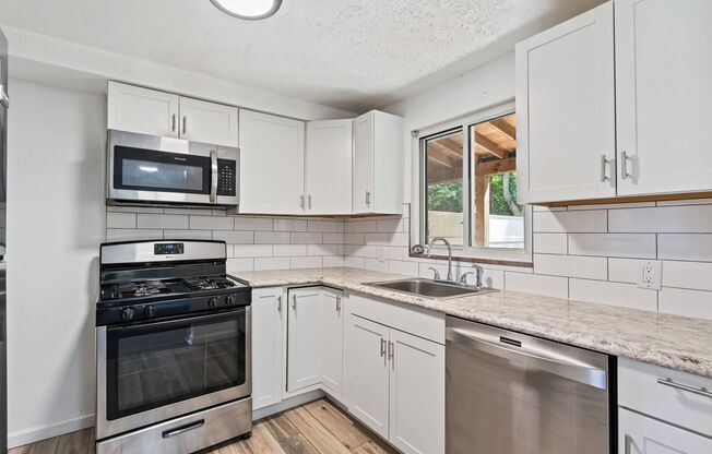 Newly Renovated 2 Bed, 1 Bath Home - Off-Street Parking, Central AC & Heat - Available Now!