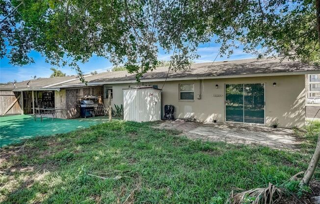 Charming 3/2 Duplex in West Bradenton with Private Yard and Carport