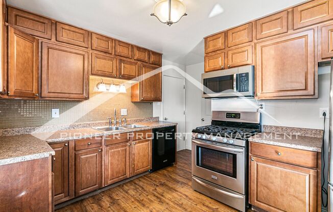 Spacious Home With Fenced In Back Yard!