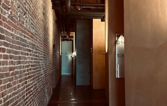 EXQUISITE BRICK & TIMBER LIVE/WORK LOFT IN PRIME SOUTH BEACH LOCATION