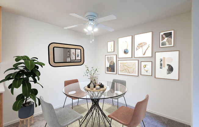 A living room with a glass table surrounded by chairs and pictures on the wall.