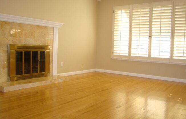 3 bedroom, hardwood floors, remodeled kitchen and bathrooms, laundry in garage