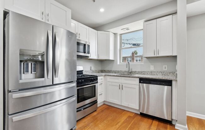 Available Now! 2 Level, 2 Bedroom Condo in Hill East!