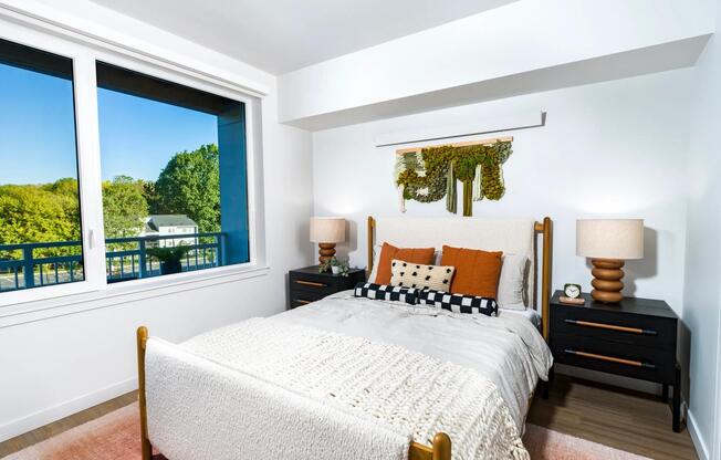 This inviting bedroom is the perfect cozy retreat to unwind and wake up feeling refreshed.