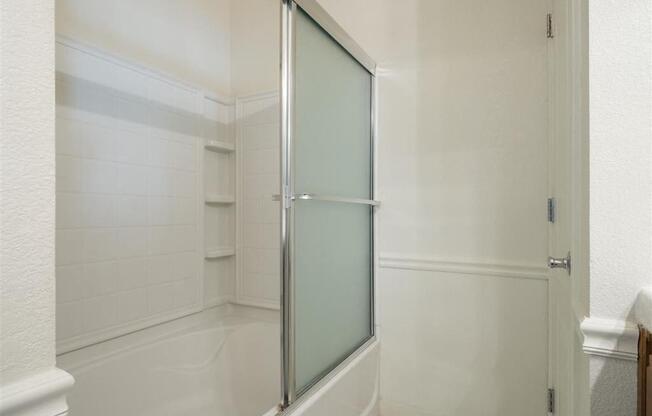 Glass-Enclosed Showers at Dartmouth Tower at Shaw, Clovis, CA