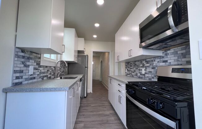 Updated 2BR house with Garage!