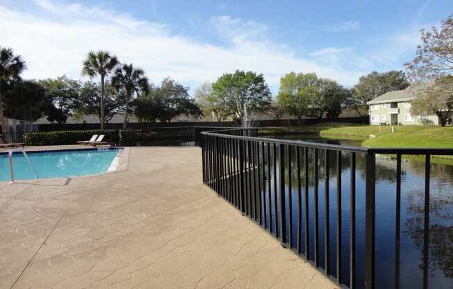 Pool with small lake on site Mira Lagos Bradenton, Florida