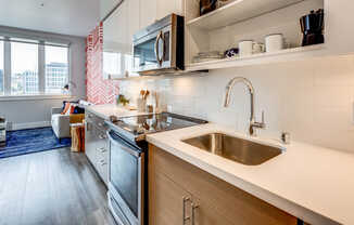 Kitchen with Stainless Steel Appliances and Quartz Countertops