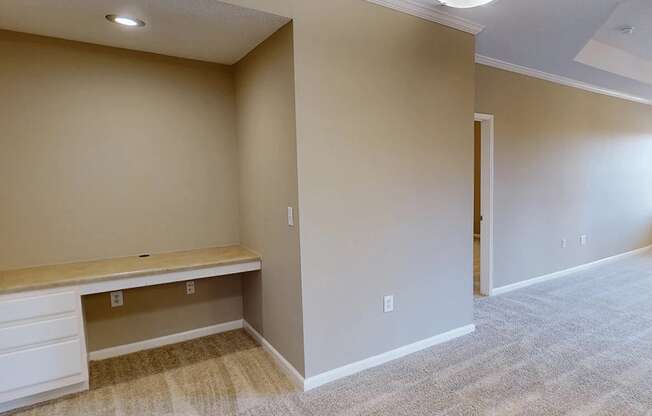 apartment with bonus room with an office desk