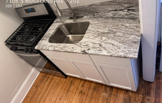 7106 S RIDGELAND AVE