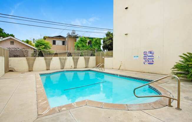 the swimming pool at the villa apartments