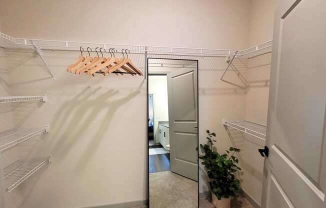 a walk in closet in a 555 waverly unit