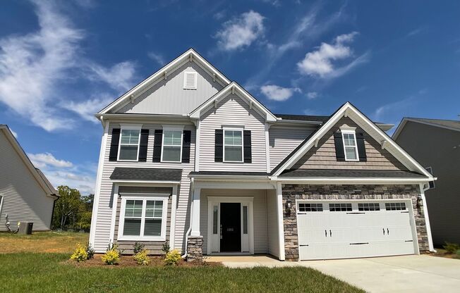 Gorgeous, Spacious Home in Graham!  Rogers Spring Neighborhood!  Almost Brand New!