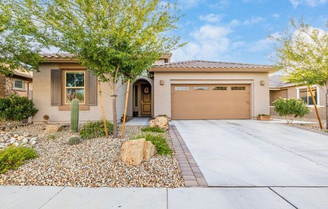 Gorgeous single level 4-bedroom, 3-bathroom home nestled in an upscale gated community in Peoria