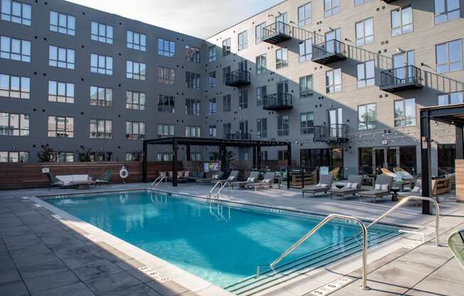 a swimming pool at a hotel in a large building