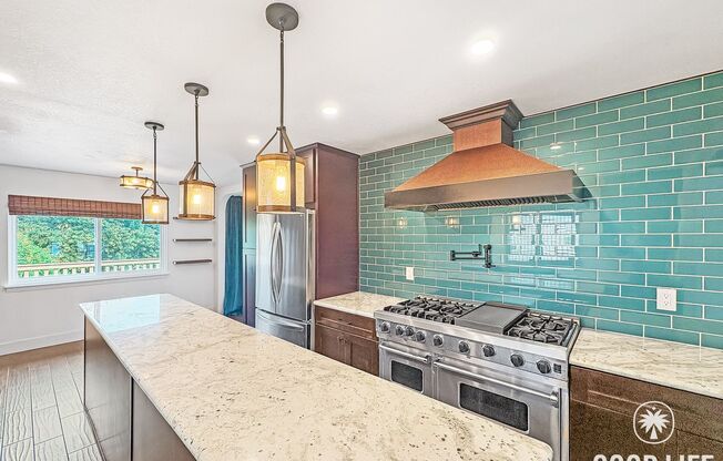 Spacious Vista Home with Large Lot, Designer Finishes & Guest Suite