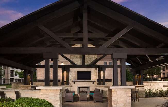 StoneLedge Apartments - Outdoor pool lounge - Apartments near Grapevine Mills Mall