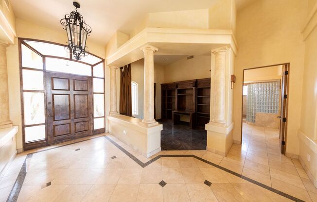 Beautiful custom home in Phoenix with 5 beds, 5.5 baths, pool, and large lot!